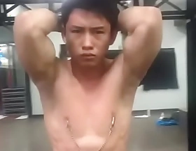 Asian young man indonesia manful nipple clamp to pain