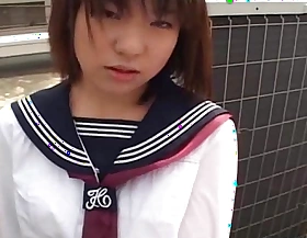 Japanese schoolgirl sucks schlong chock-a-block