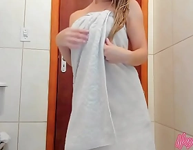 Exit the bath with just a towel, dancing coupled with applying council cream