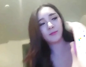 Korean cam model shows she has milk in their equally titties